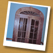Details such as curved transoms and large moulding profiles add a great deal to basic doors and windows.
